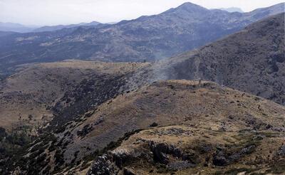 Zicht op de zogenaamde Alexanderheuvel in Sagalassos, met erachter de site van Düzen Tepe.