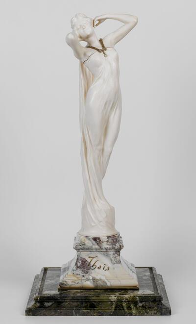 Godefroid Devreese, Thaïs, ca. 1899, ivoor, 55 cm (totale hoogte), 41,5 cm (hoogte beeld), 29,5 cm (breedte basis), 17,5 cm  (breedte beeld). Fin-de-sieclemuseum