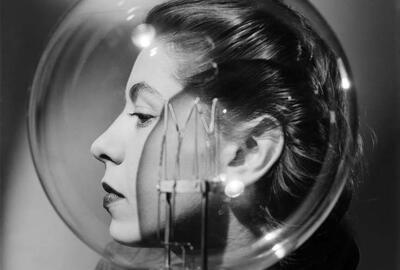 Lee Miller, Model with lightbulb, London, England c.1943